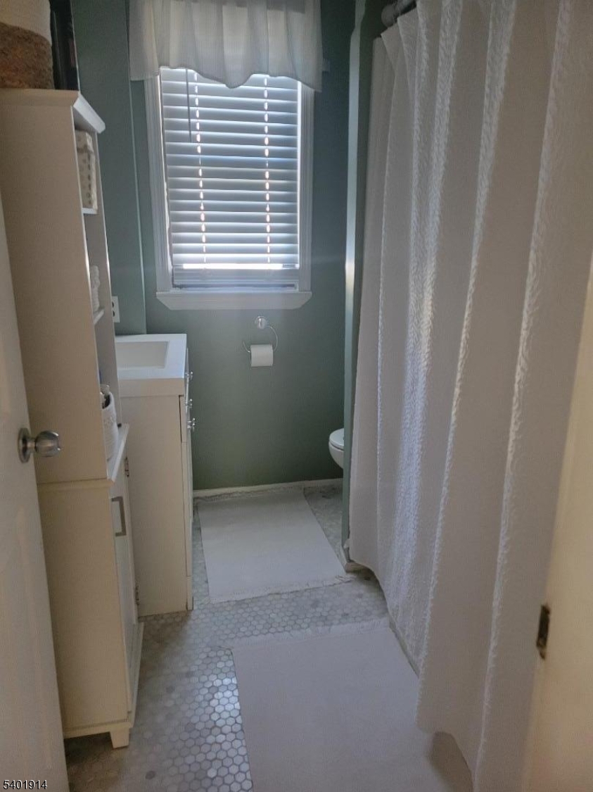 425 Main Street West Orange, NJ 07052 - Photo 3 of 20 a view of a bathroom with a window