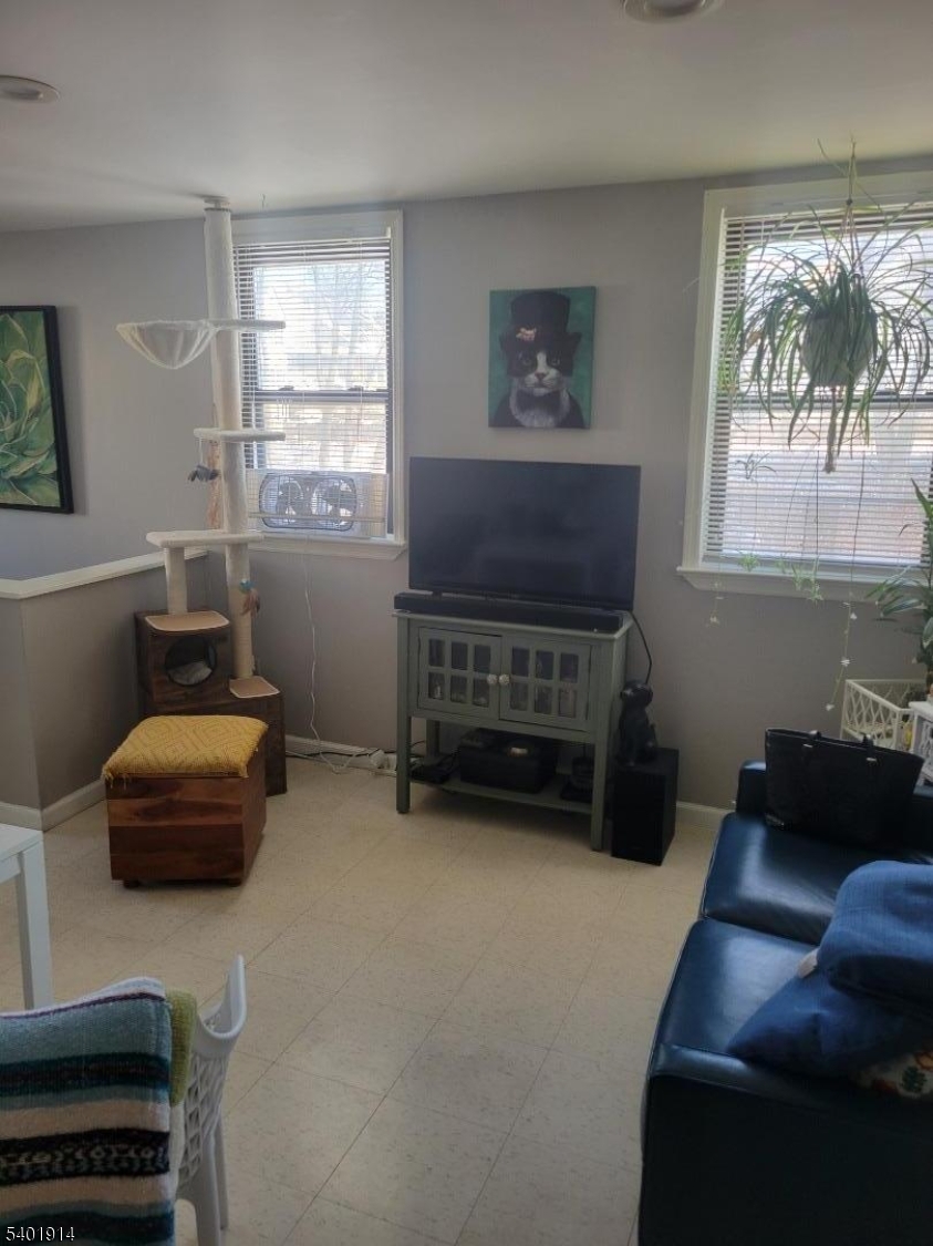 425 Main Street West Orange, NJ 07052 - Photo 5 of 20 a bedroom with furniture and a window