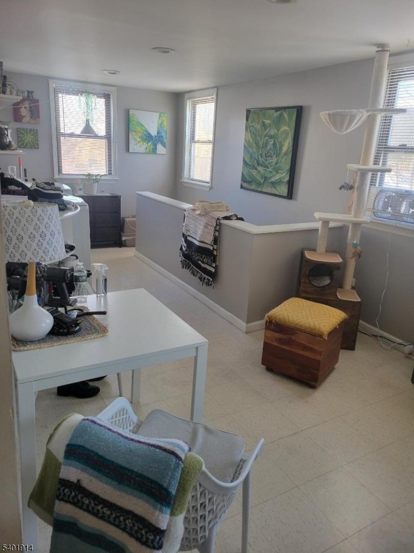 425 Main Street West Orange, NJ 07052 - Photo 6 of 20 a living room with furniture and a window