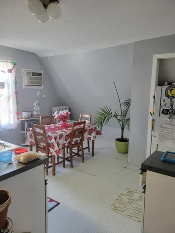 a dining room filled with lots of furniture