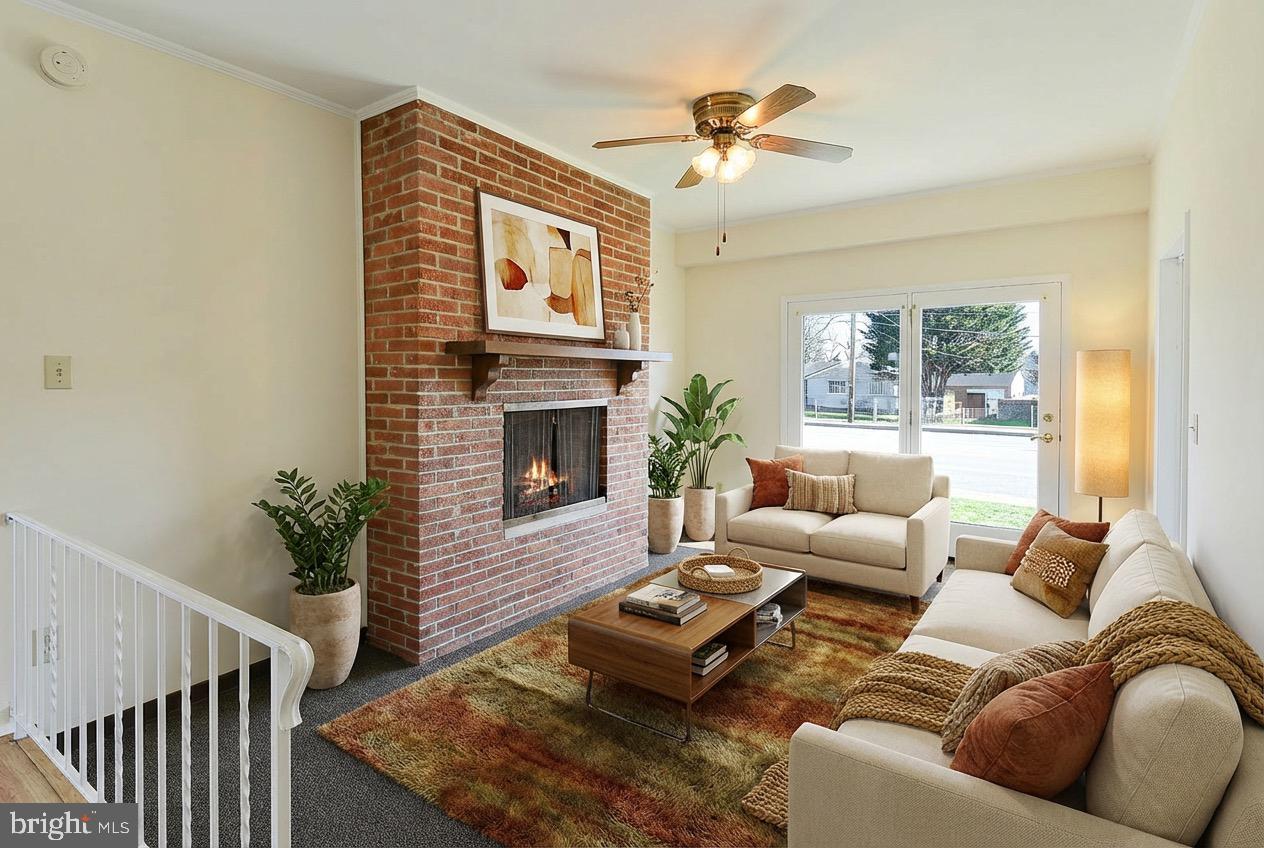 3702 East Joppa Road Nottingham, MD 21236 - Photo 14 of 65 a living room with furniture and a fireplace