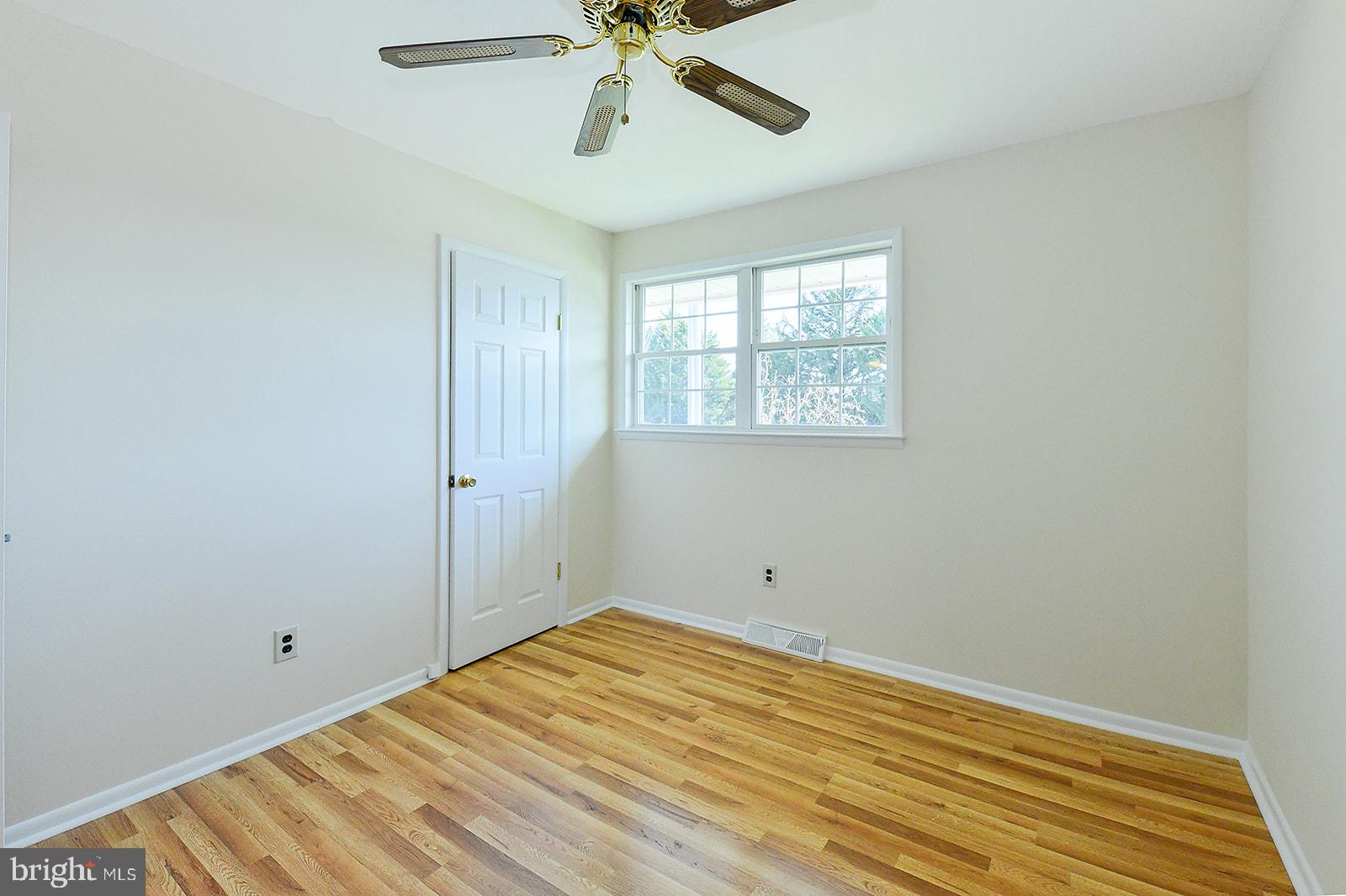 3702 East Joppa Road Nottingham, MD 21236 - Photo 40 of 65 a view of a room with wooden floor and windows