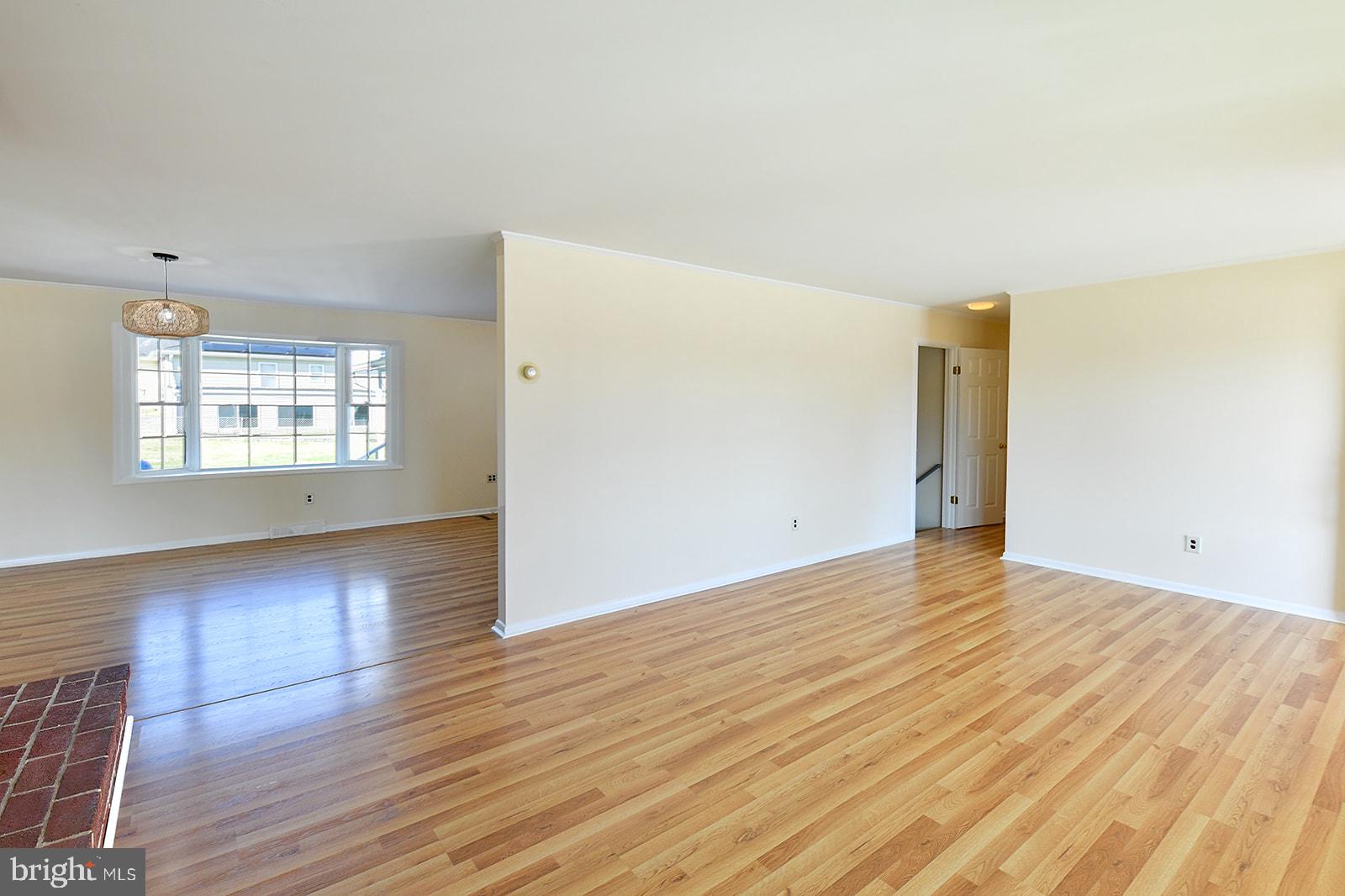3702 East Joppa Road Nottingham, MD 21236 - Photo 65 of 65 an empty room with wooden floor and windows