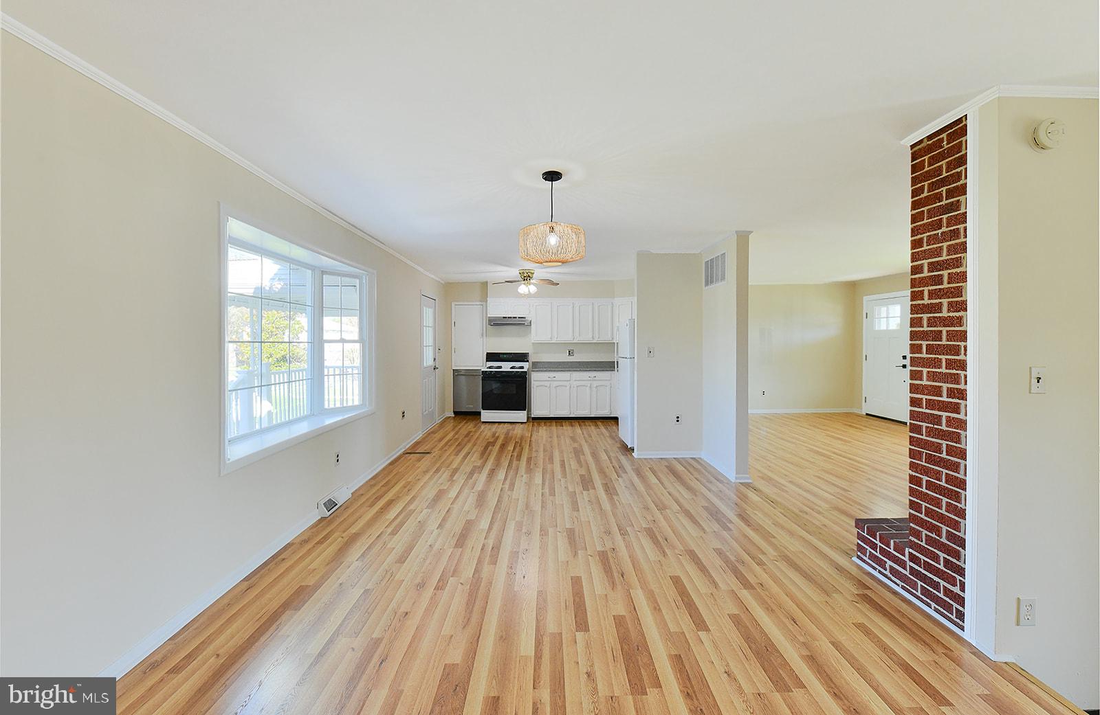 3702 East Joppa Road Nottingham, MD 21236 - Photo 8 of 65 a view of empty room with wooden floor