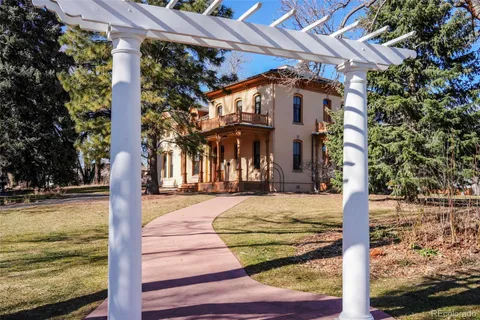a sign board on the side of a road