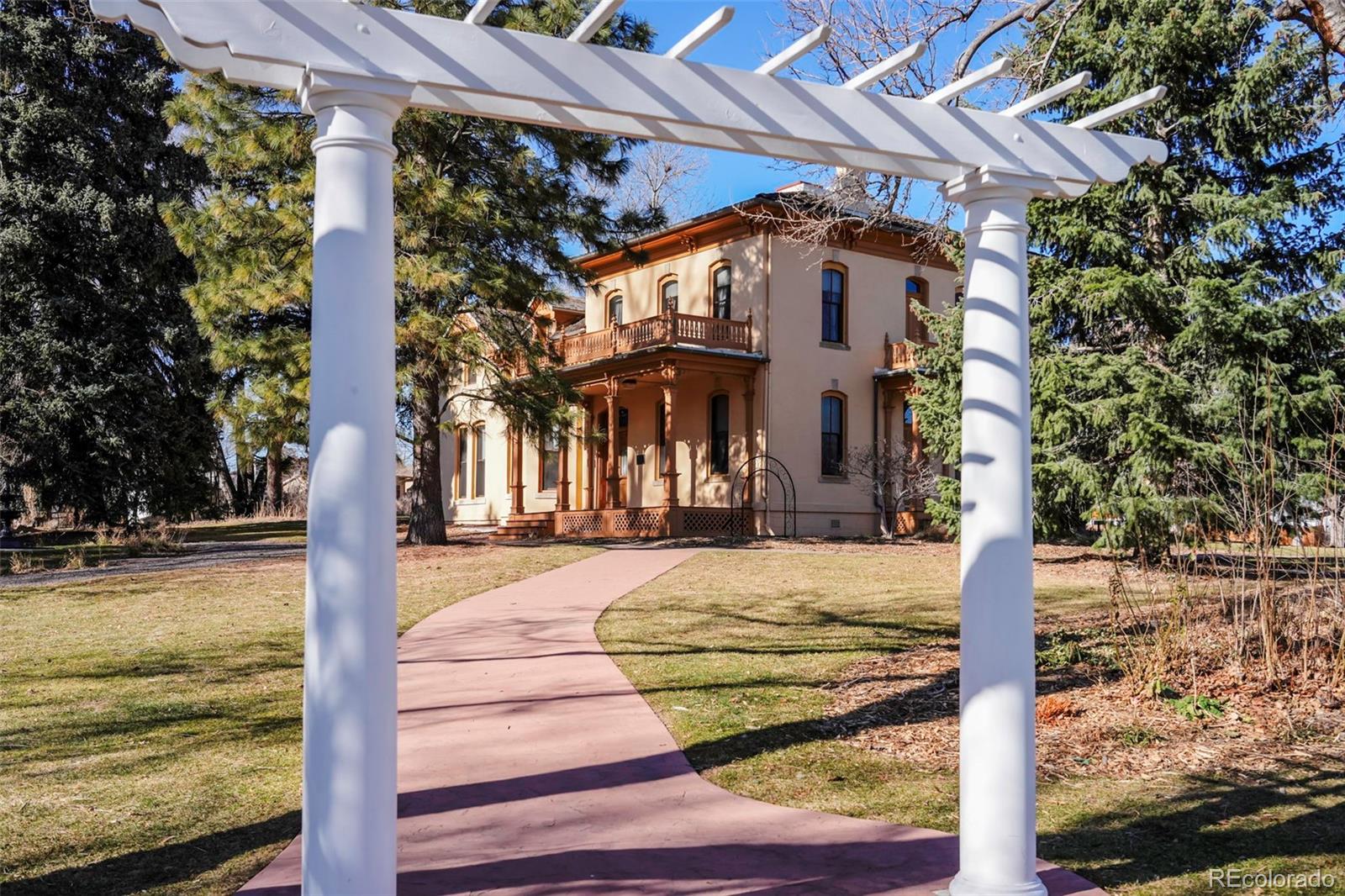 2808 Eaton Street Wheat Ridge, CO 80214 - Photo 26 of 36 a sign board on the side of a road