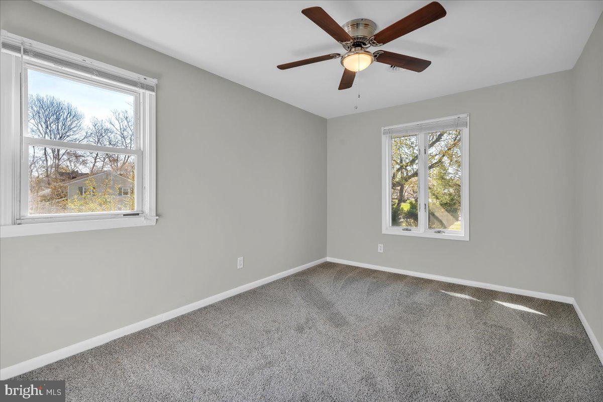 301 County House Road Sewell, NJ 08080 - Photo 13 of 23 a view of an empty room with a window