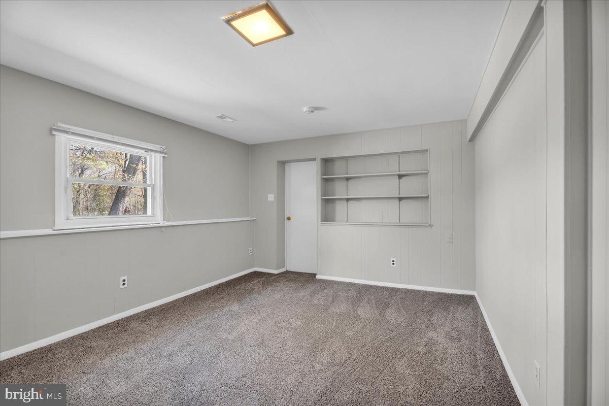 301 County House Road Sewell, NJ 08080 - Photo 18 of 23 an empty room with windows