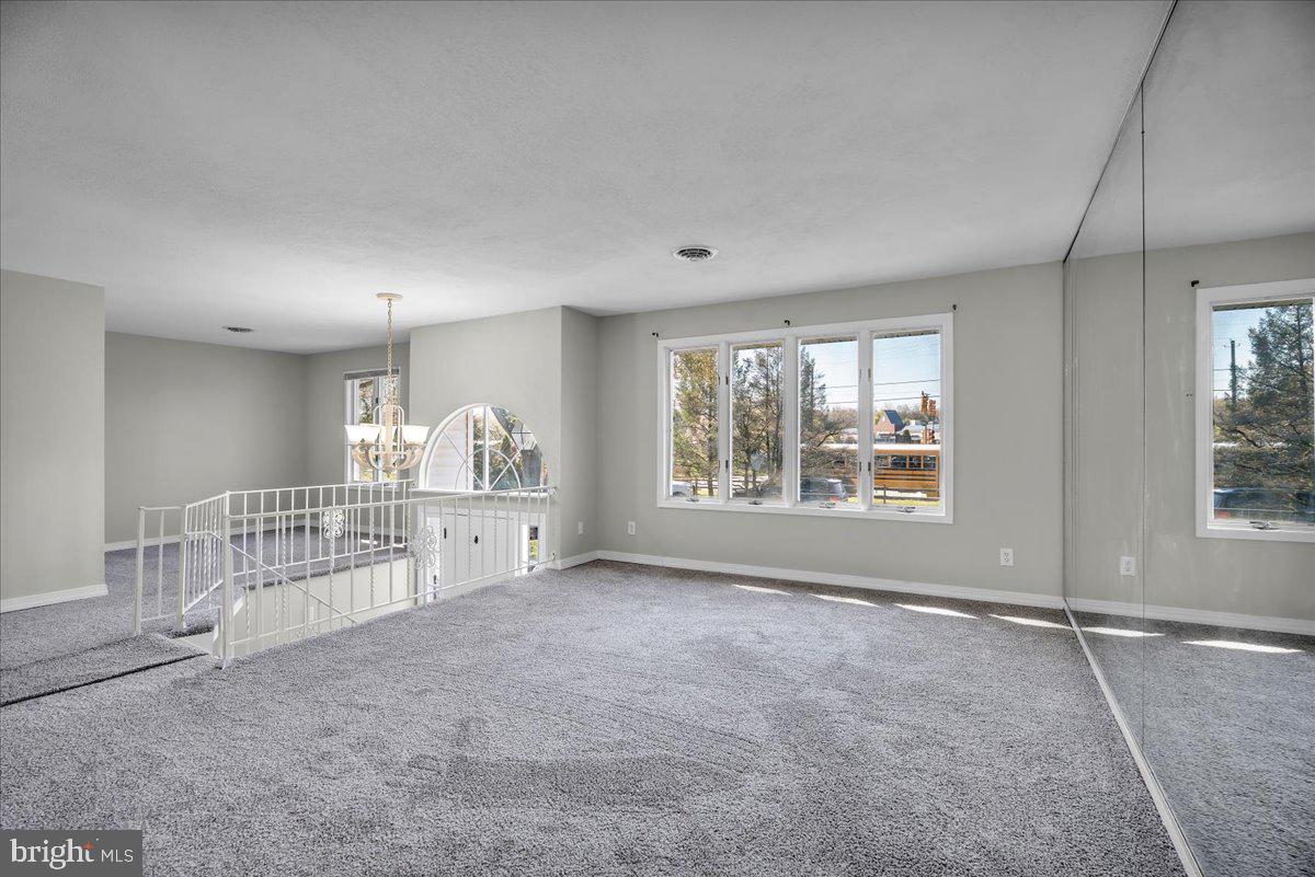 301 County House Road Sewell, NJ 08080 - Photo 6 of 23 a big room with windows and wardrobe