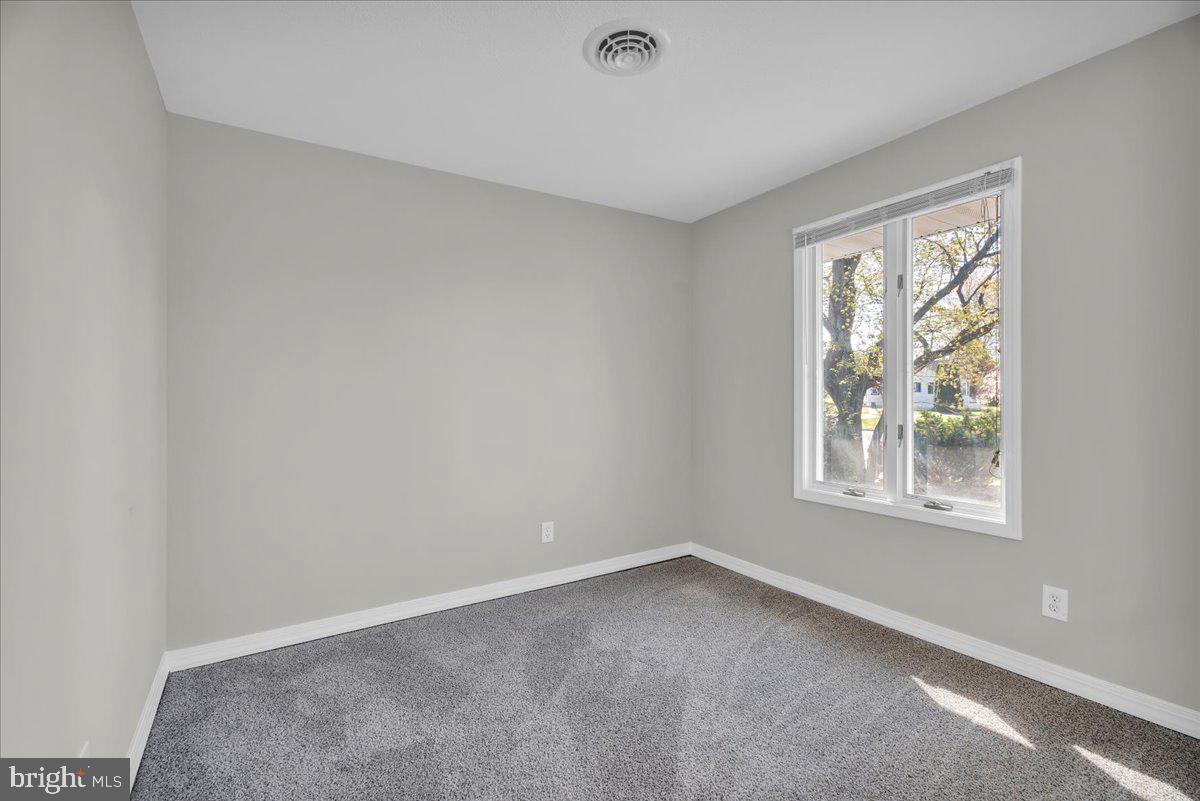 301 County House Road Sewell, NJ 08080 - Photo 10 of 23 an empty room with a window