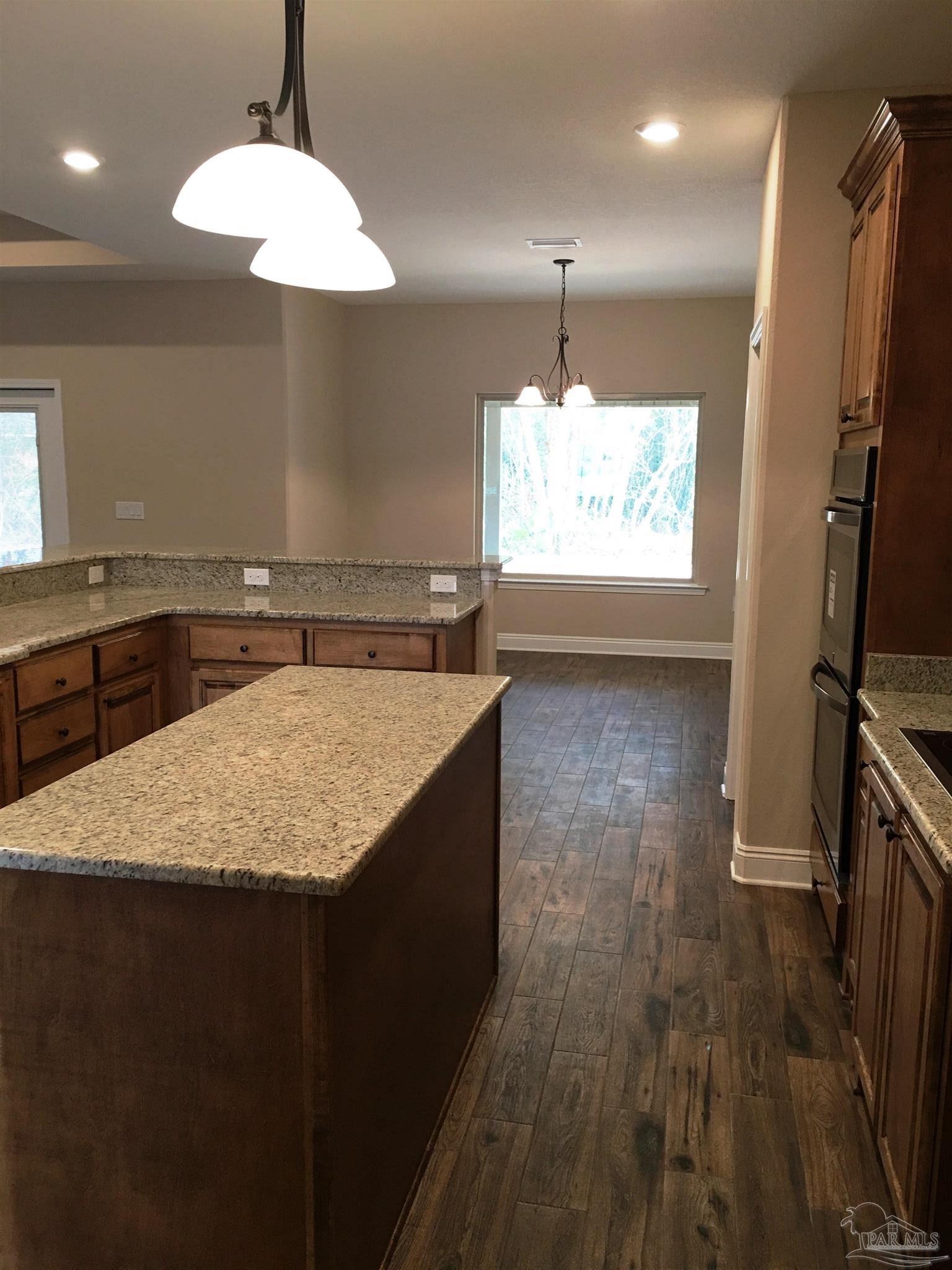 5224 South A Jones Road Milton, FL 32583 - Photo 8 of 35 A view from kitchen to nook is shown here.