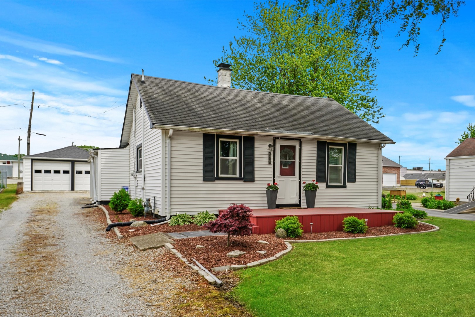 635 Birch Drive Beecher, IL 60401 - Photo 1 of 14 a view of a house with backyard sitting area and garden