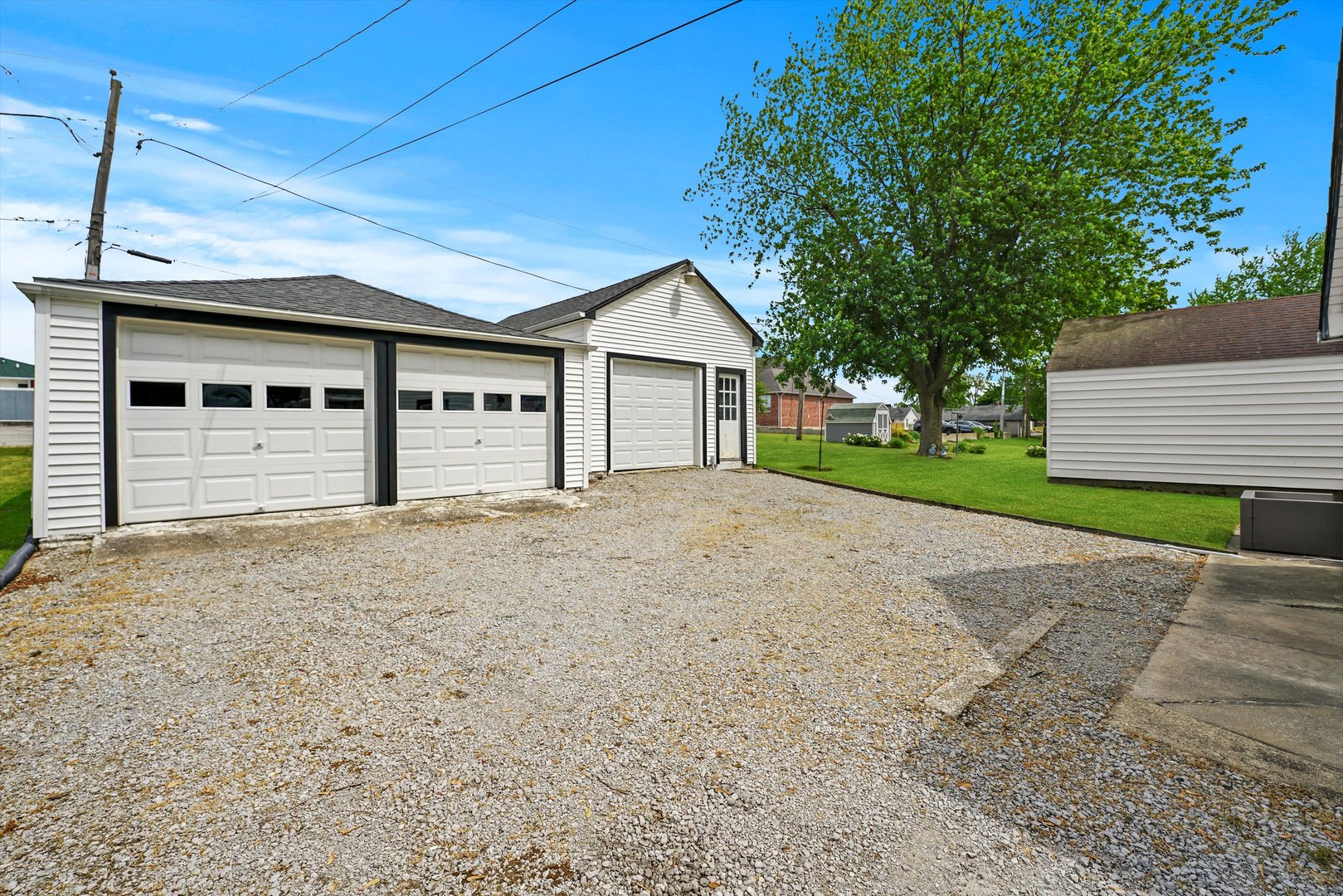 635 Birch Drive Beecher, IL 60401 - Photo 13 of 14 a front view of a house with a yard and garage