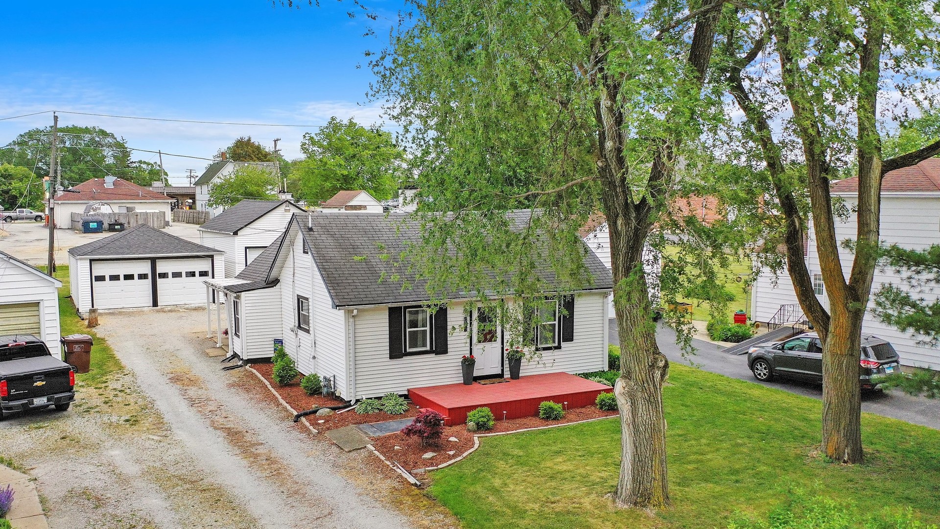 635 Birch Drive Beecher, IL 60401 - Photo 2 of 14 a view of a house with backyard and a tree