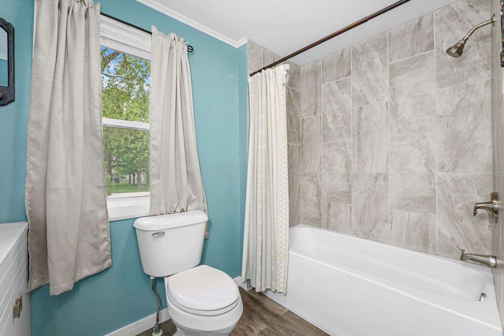 635 Birch Drive Beecher, IL 60401 - Photo 9 of 14 a white toilet sitting next to a bath tub