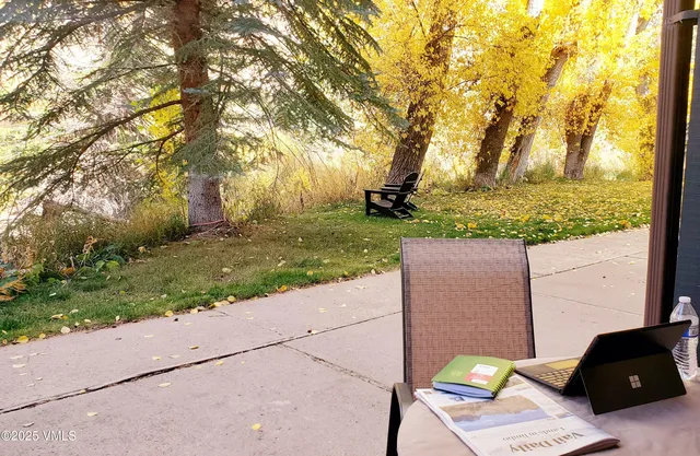 a view of backyard with green space