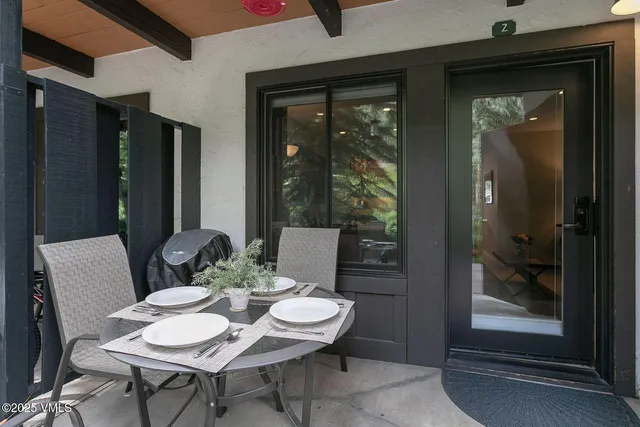 a view of a balcony dining area