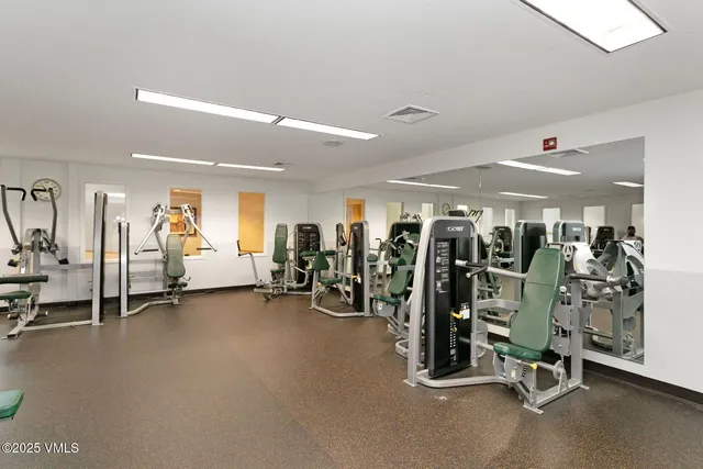 a view of a room with gym equipment