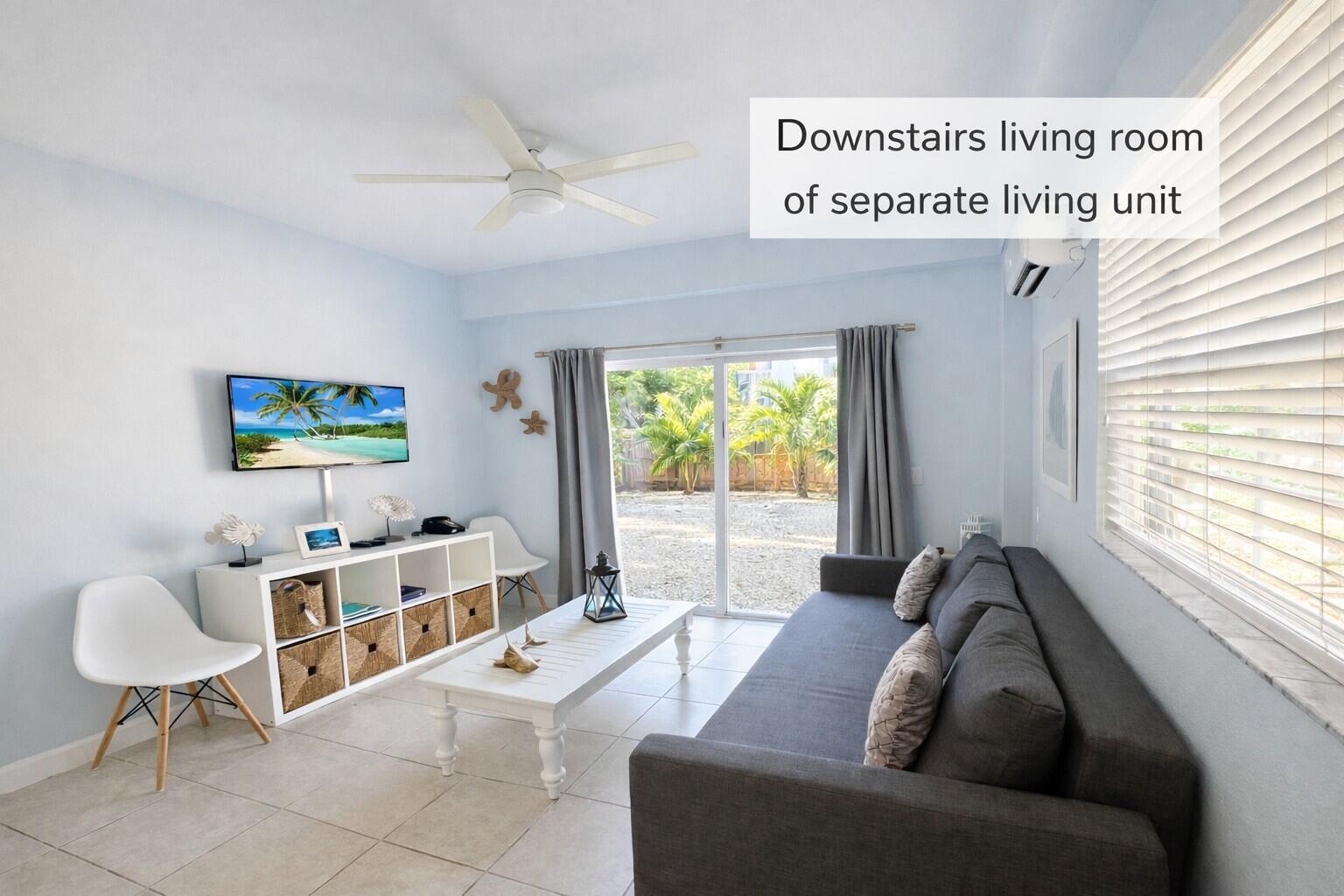 335 Bayview Avenue Key Largo, FL 33037 - Photo 13 of 57 a living room with furniture and a window