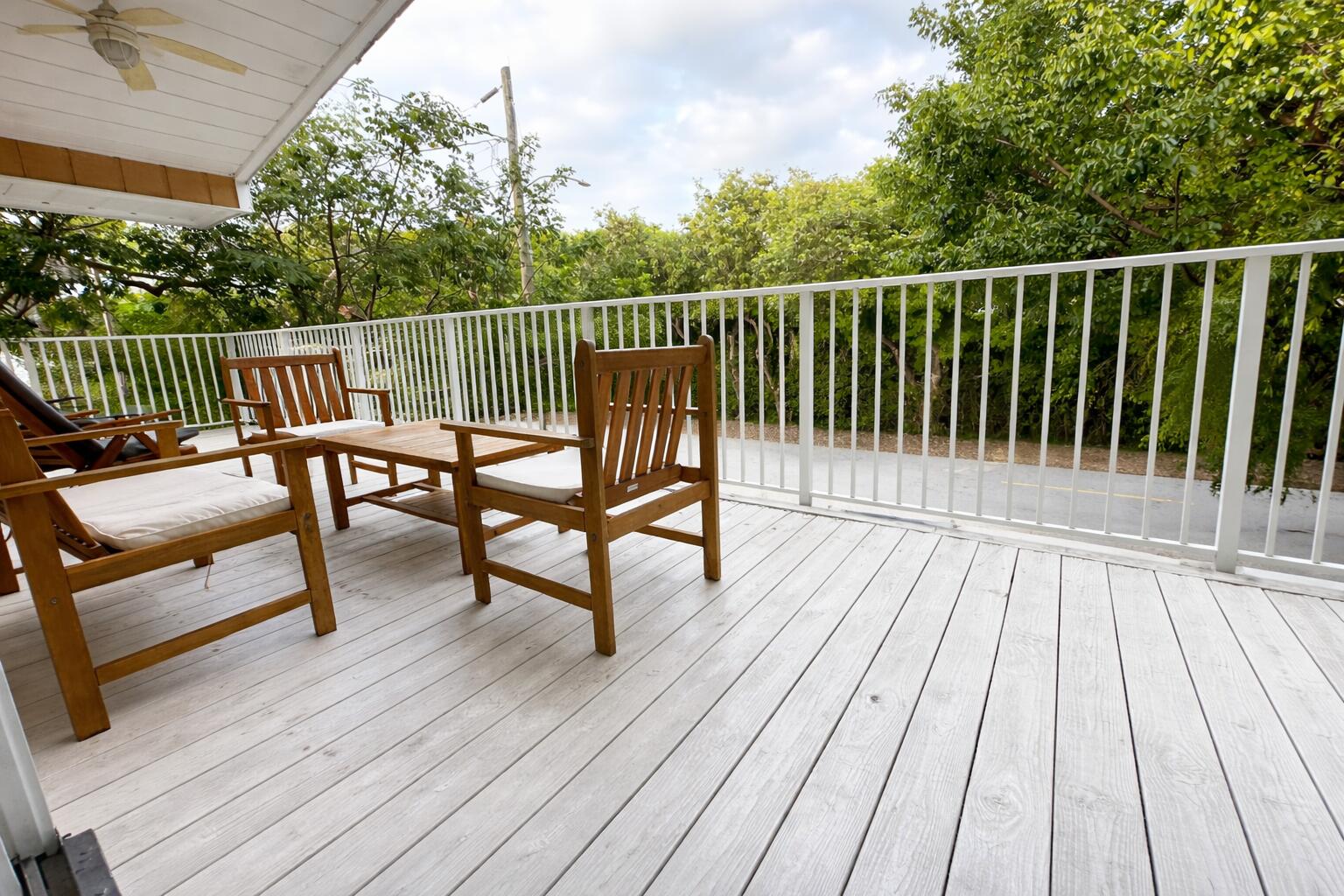 335 Bayview Avenue Key Largo, FL 33037 - Photo 21 of 57 a balcony with wooden floor view