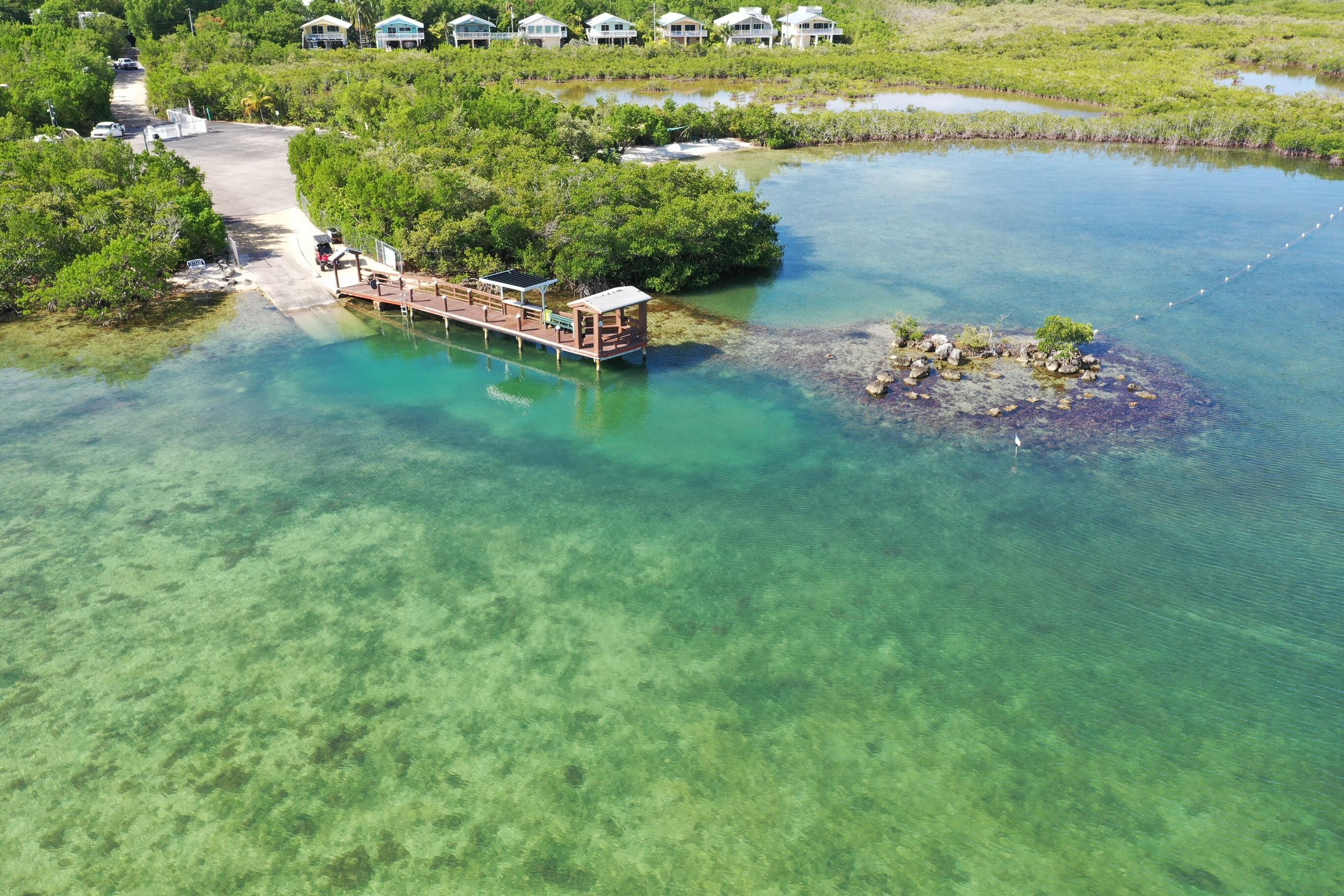 335 Bayview Avenue Key Largo, FL 33037 - Photo 30 of 57 an aerial view of a house with a yard lake lake view and mountain view