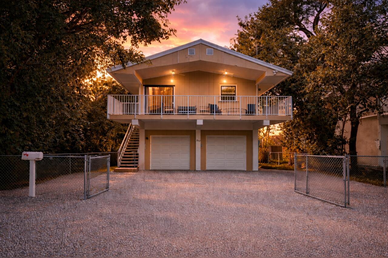335 Bayview Avenue Key Largo, FL 33037 - Photo 54 of 57 a view of a house with backyard and sitting area