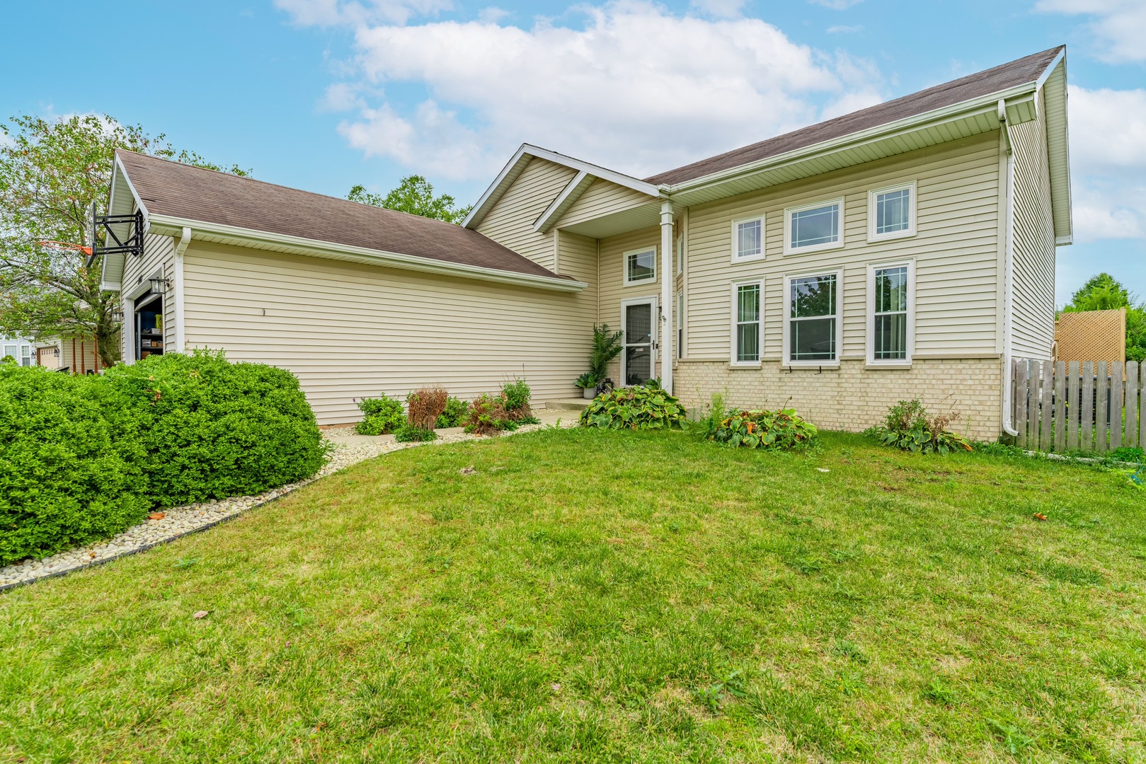 2008 Gray Hawk Court Plainfield, IL 60586 - Photo 1 of 23 a front view of a house with garden