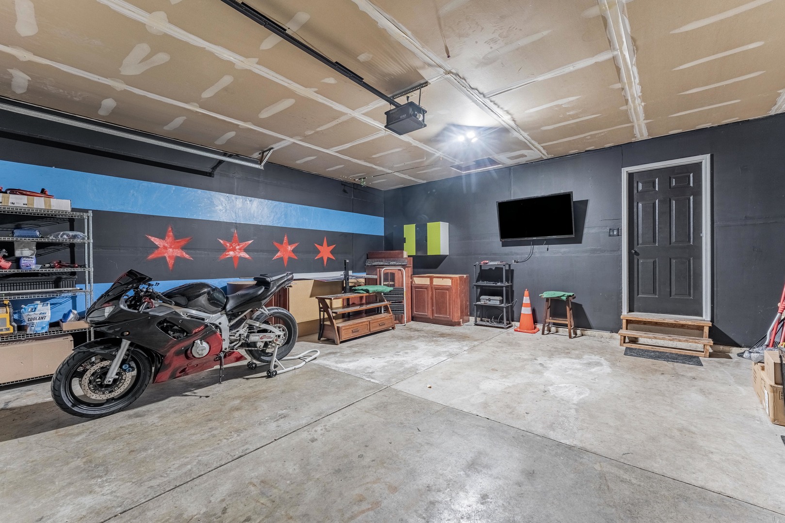 2008 Gray Hawk Court Plainfield, IL 60586 - Photo 23 of 23 a view of a garage with a bike and a car