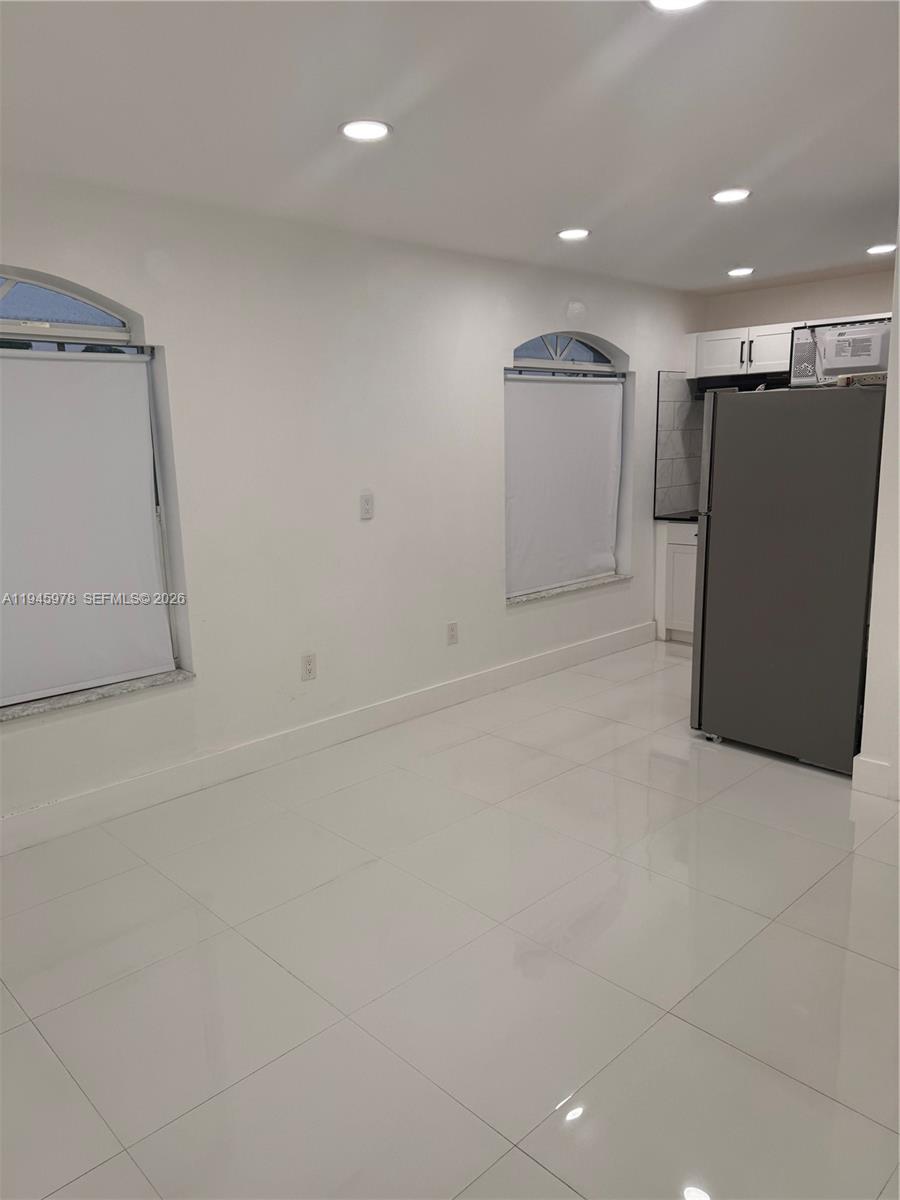 14320 Southwest 147th Court, Unit E1 Miami, FL 33196 - Photo 1 of 8 a view of an empty room