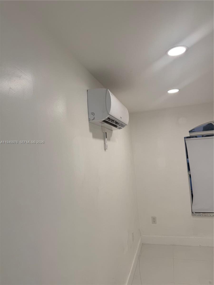 14320 Southwest 147th Court, Unit E1 Miami, FL 33196 - Photo 3 of 8 a bathroom with a shower