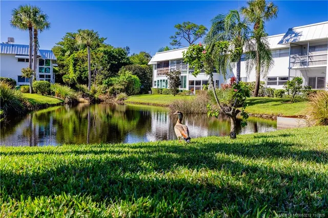 a view of a lake with a house