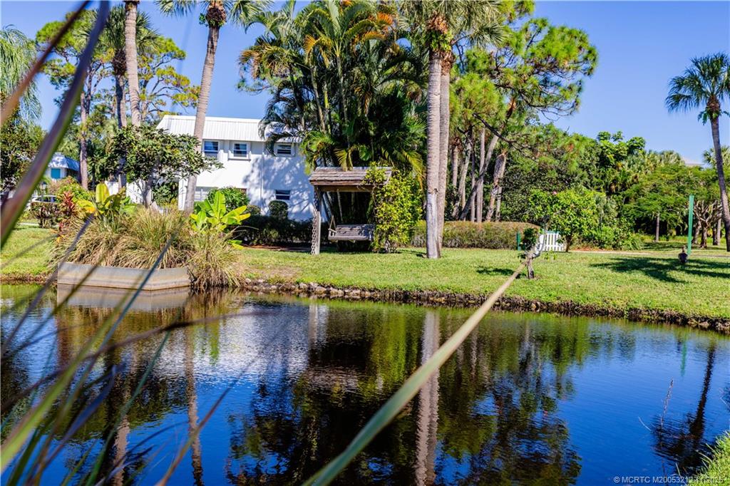 2929 Southeast Ocean Boulevard, Unit K1 Stuart, FL 34996 - Photo 19 of 26 a view of a lake with a house