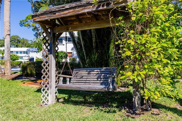 a view of a balcony with an ocean
