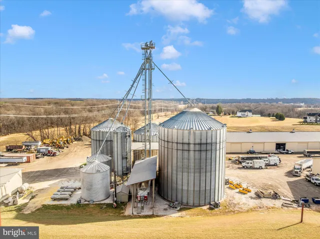 a view of a terrace with a table and chairs
