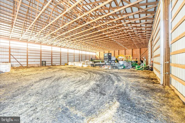 an outdoor space with furniture and garden view