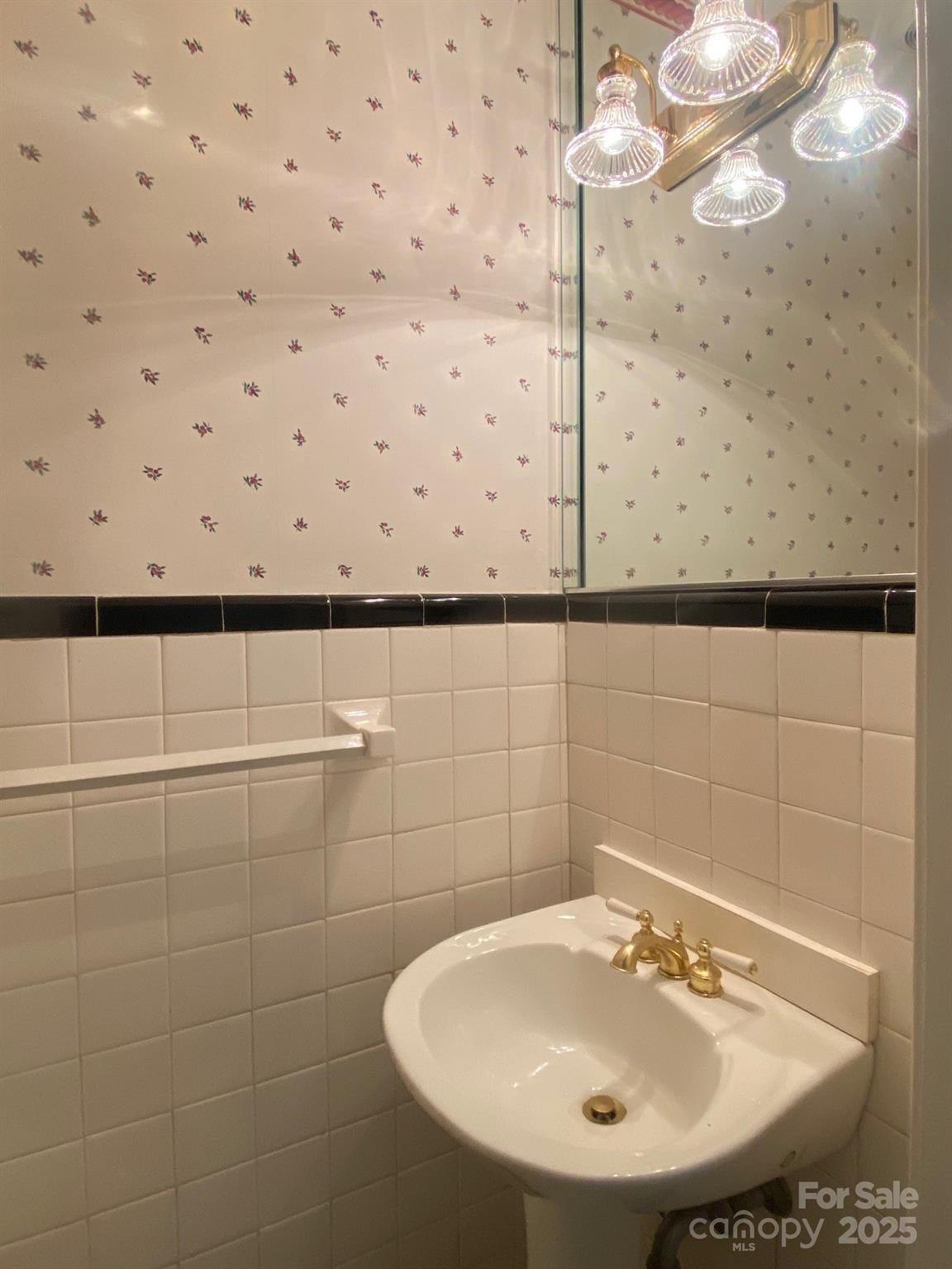 1017 Andover Road Charlotte, NC 28211 - Photo 18 of 20 a bathroom with a sink toilet and shower