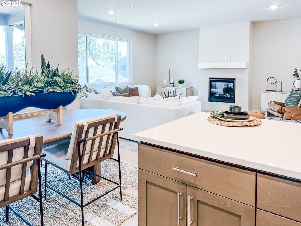 2607 South 6th Way Ridgefield, WA 98642 - Photo 20 of 32 a kitchen with a table chairs and a stove
