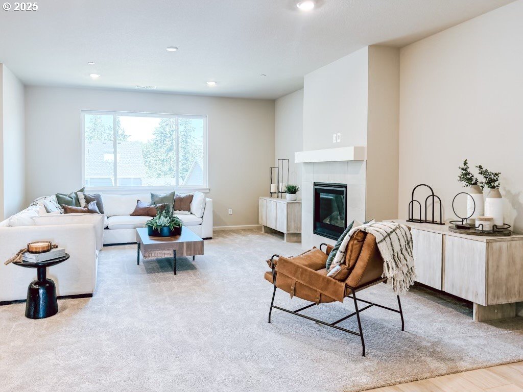 2607 South 6th Way Ridgefield, WA 98642 - Photo 23 of 32 a living room with furniture and a fireplace