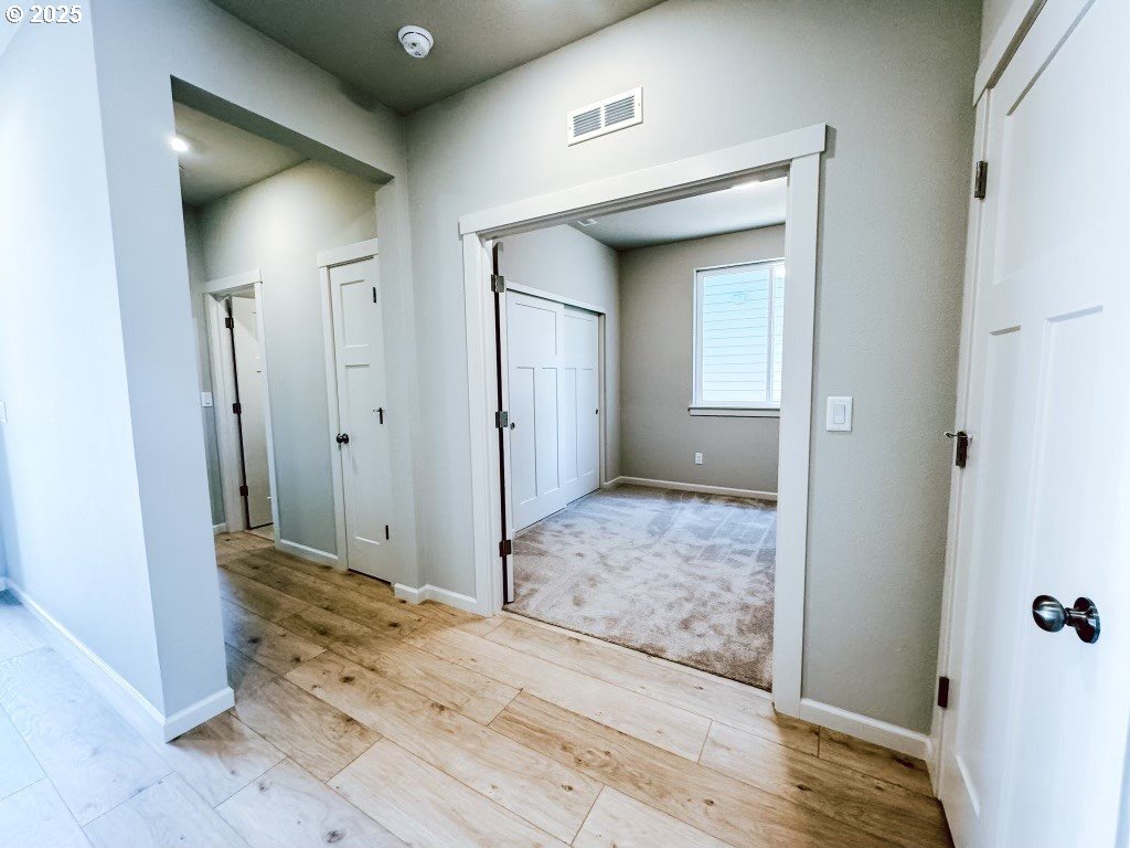 2607 South 6th Way Ridgefield, WA 98642 - Photo 6 of 32 a view of hallway with wooden floor