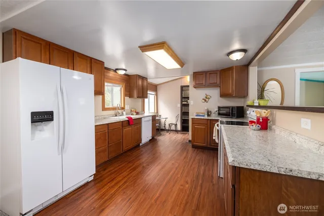 a kitchen with a stove and a sink