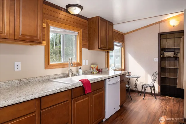 a view of a room that has a table and chair