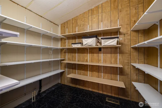 a kitchen with granite countertop a stove and a sink
