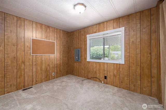 a bathroom with a sink a toilet and vanity