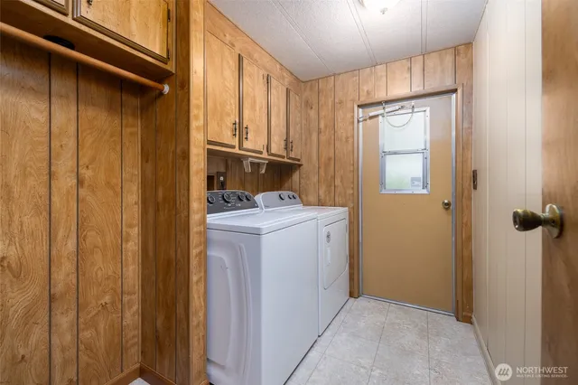 a view of a house with a yard and plant