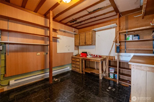 a view of entryway with wooden walls