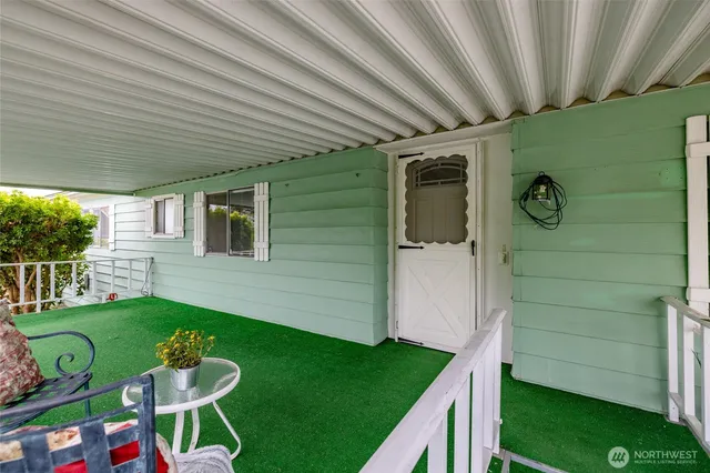 a backyard of a house with seating space