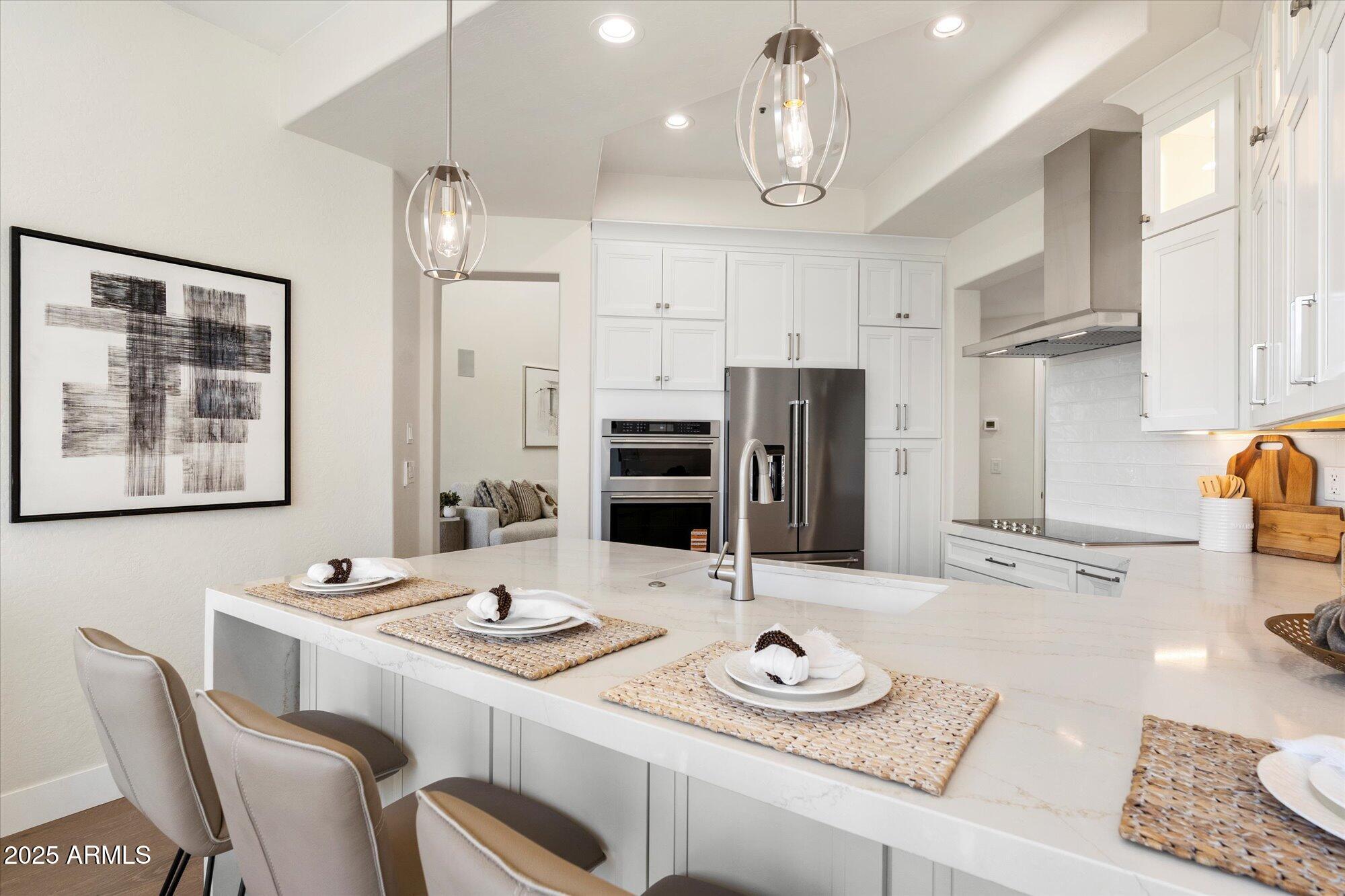 7955 East Chaparral Road, Unit 17 Scottsdale, AZ 85250 - Photo 15 of 57 Island Seating and Extra Storage