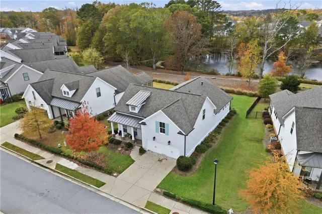 an aerial view of a house with a garden