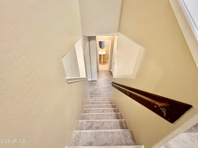 a view of a hallway with workspace