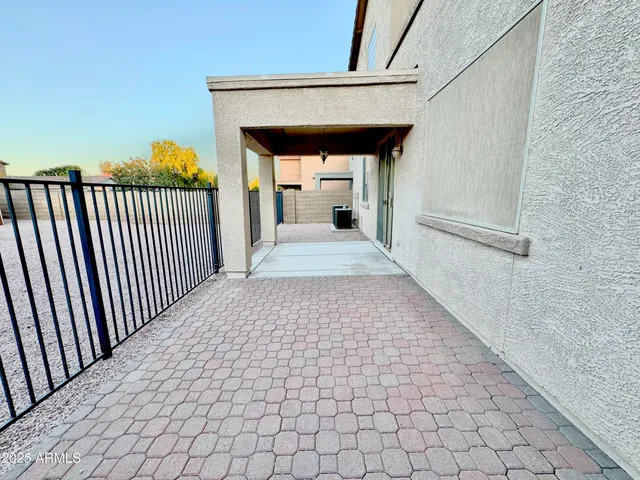 a balcony view with a garden